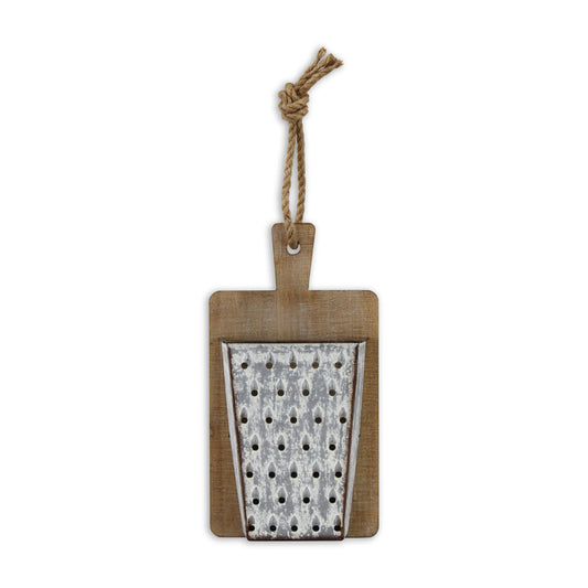 Wood and Metal Cheese grater on cutting board